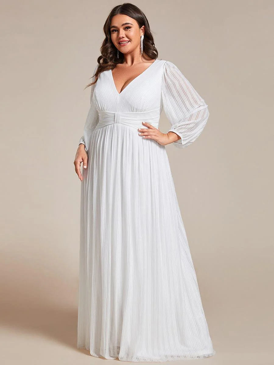 ever BRYM|Sparkle Long Sleeve Wedding Guest Dress with A-line Silhouette - Image 52